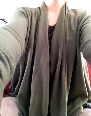 a selfie of my torso in the army green waterfall cardigan
